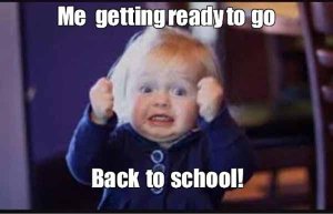 Toddler with excited face. Text reads, "me getting ready to go back to school!"