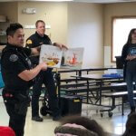 Officer reads story.